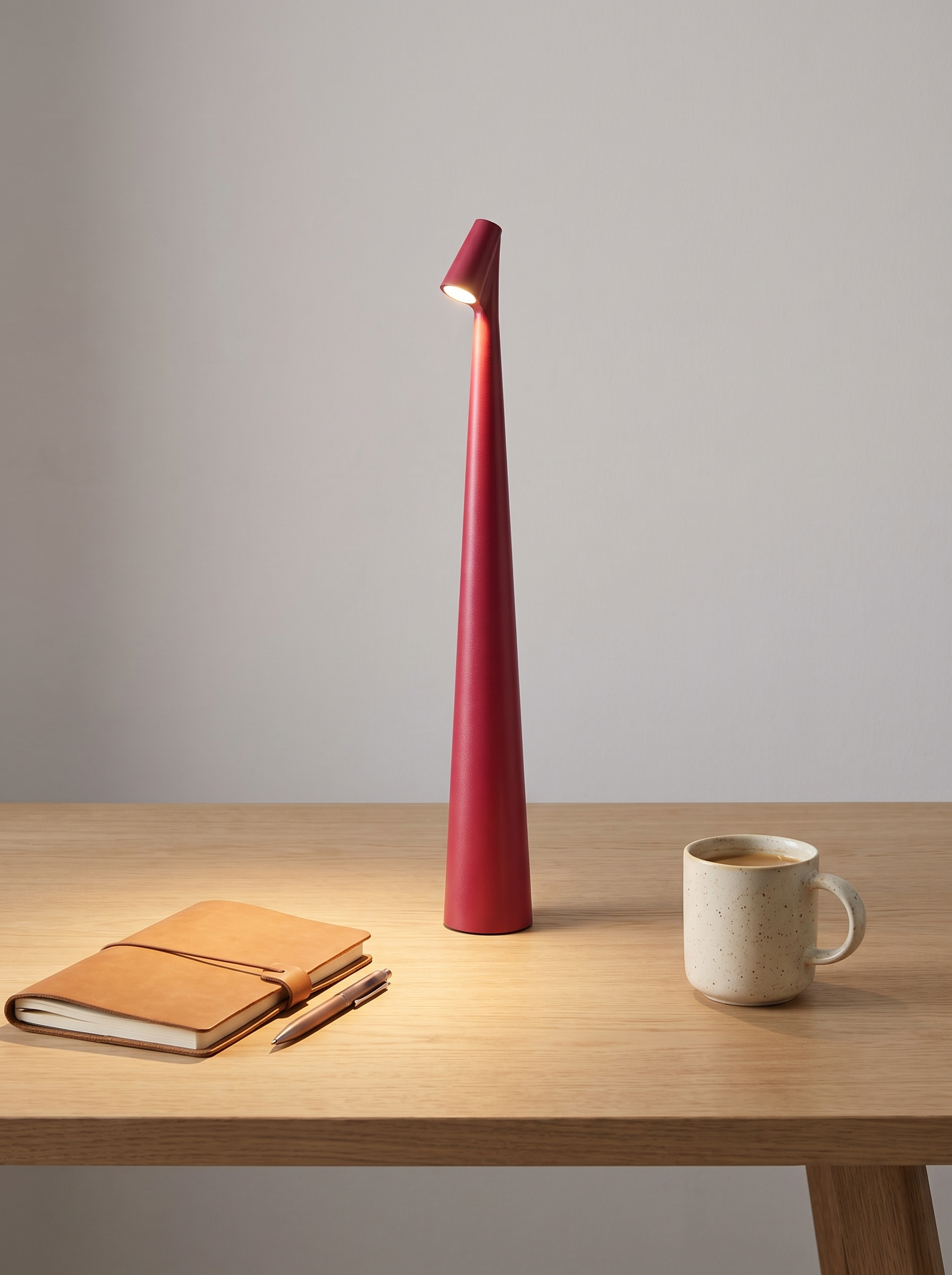 Aria cordless lamp on an oak desk